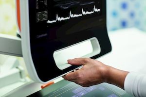 Ergonomic workstation helps minimize injuries image of adjustable workstation